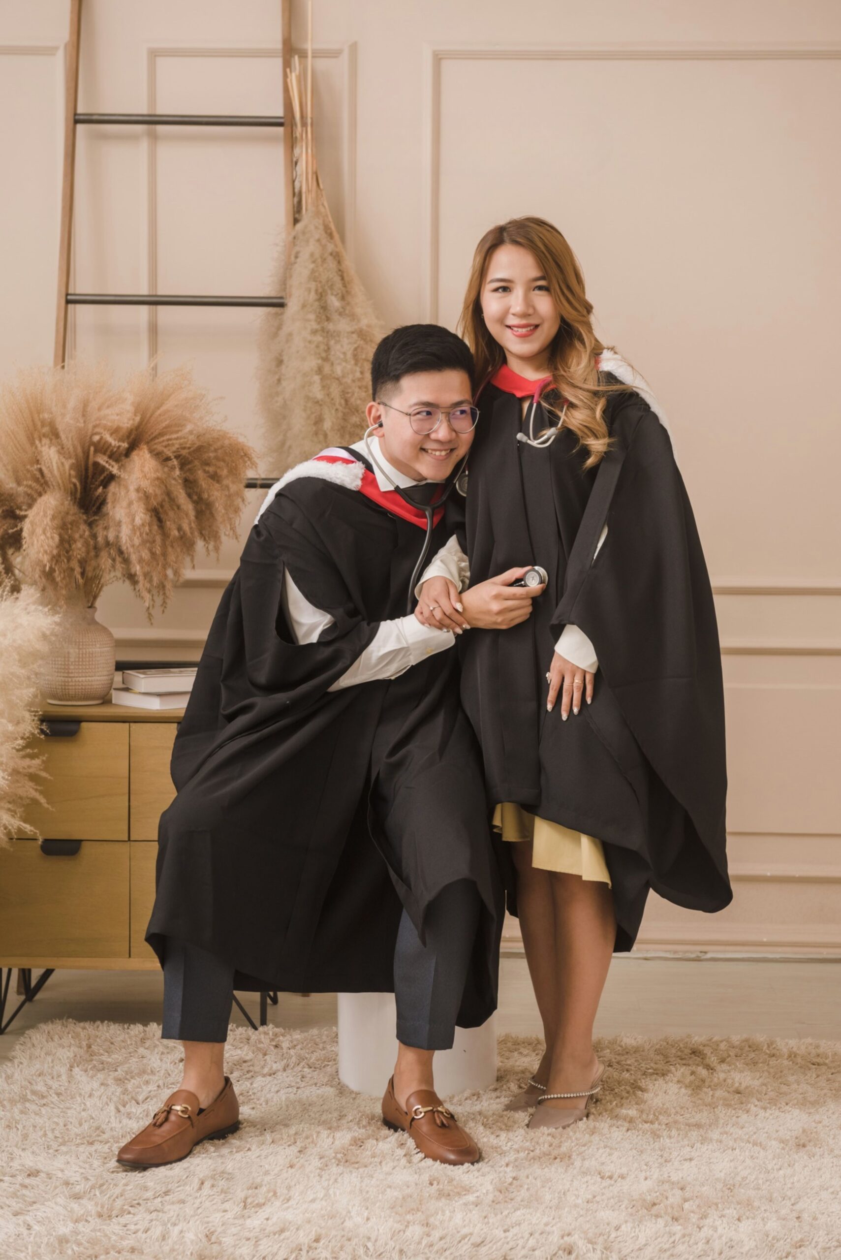 Professional graduation portrait of male graduate in cap and gown with academic confidence