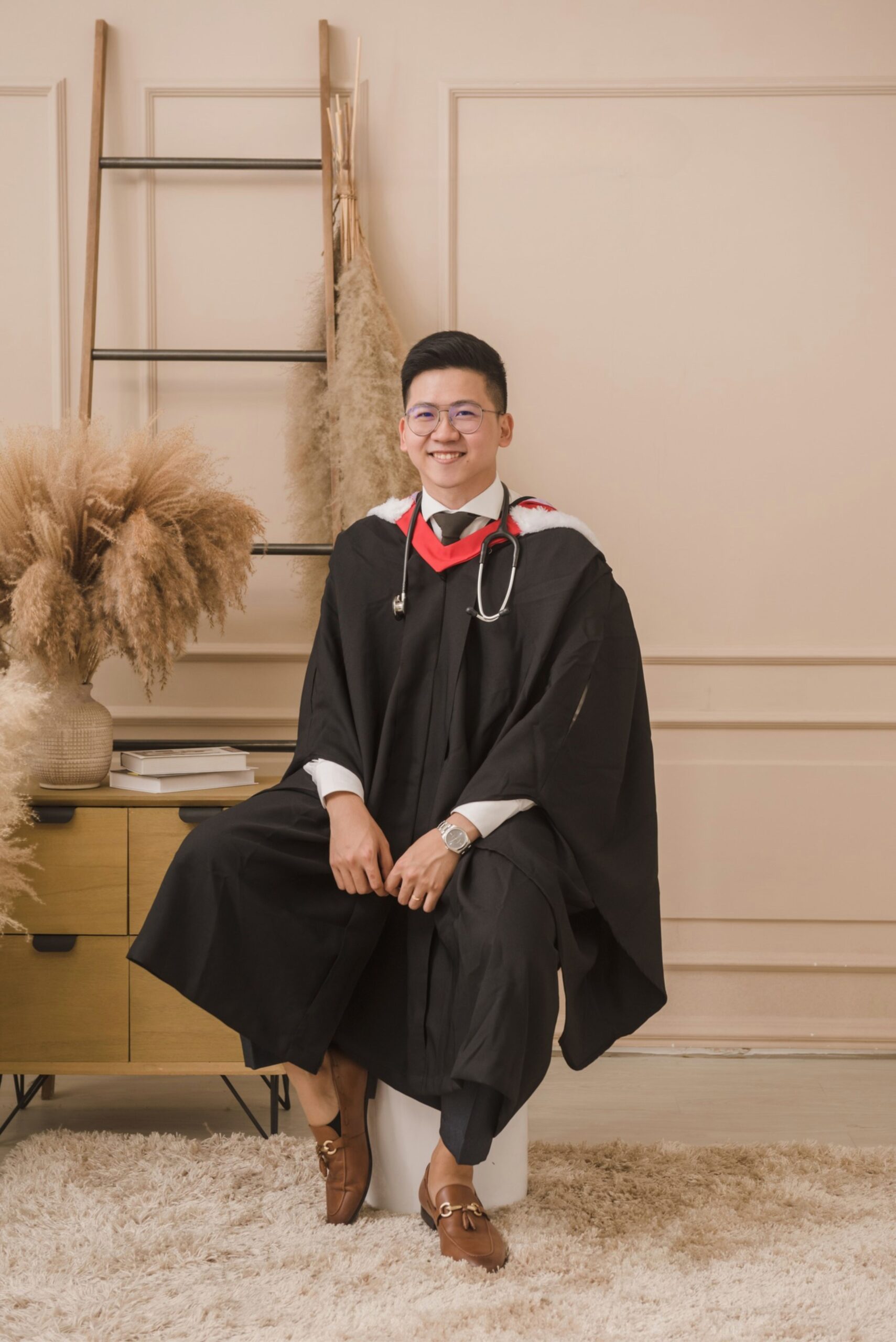 Graduation photography portrait with diploma and elegant academic studio styling