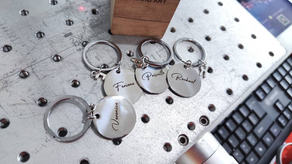 Stainless steel keychain laser engraving with personalized name marking in Malaysia
